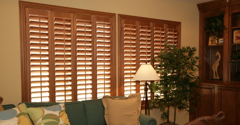 Wood shutters in Fort Myers living room.